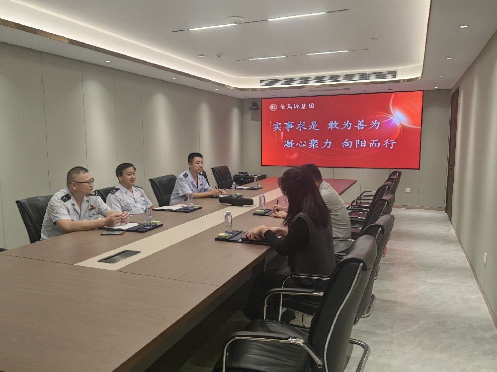 李沧区税务局党委委员、副局长王文波一行莅临恒晟源集团调研指导